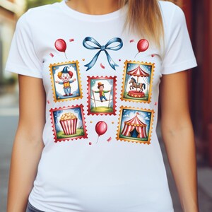 May include: White t-shirt featuring colorful circus-themed postage stamp designs. The stamps depict a clown, tightrope walker, carousel, popcorn, and a circus tent. A blue bow and red balloons add to the festive design.