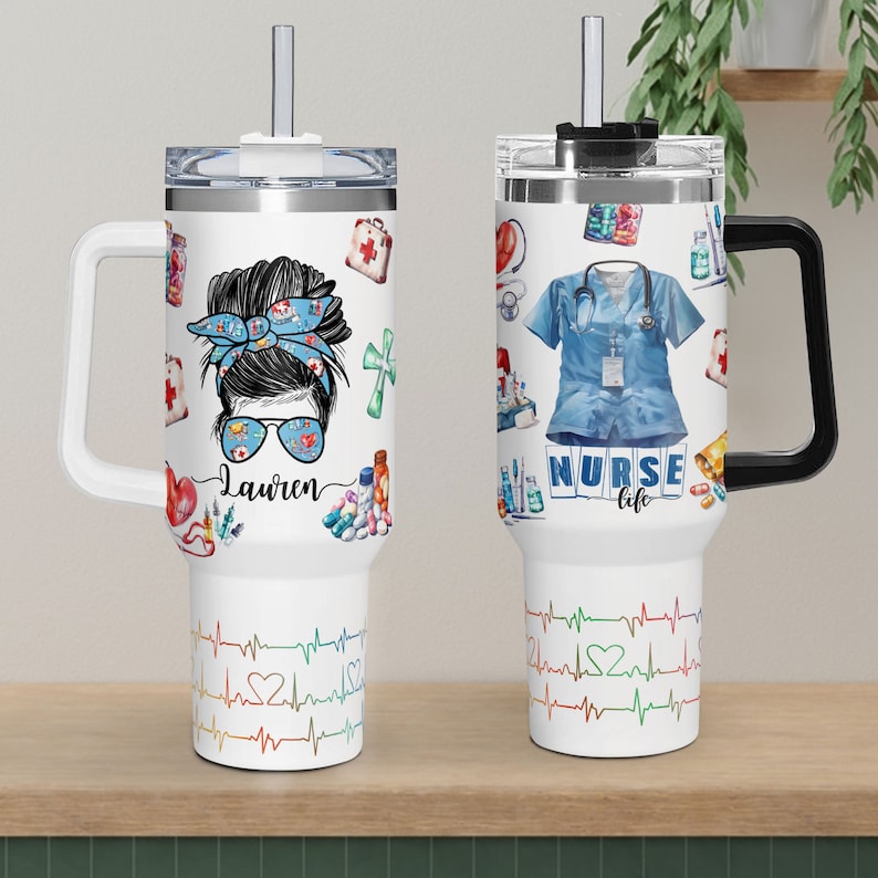 May include: White insulated tumbler with a handle and straw. One side features a nurse design with the name "Lauren", the other side has a nurse uniform and the words "NURSE life". The bottom has a colorful EKG design.