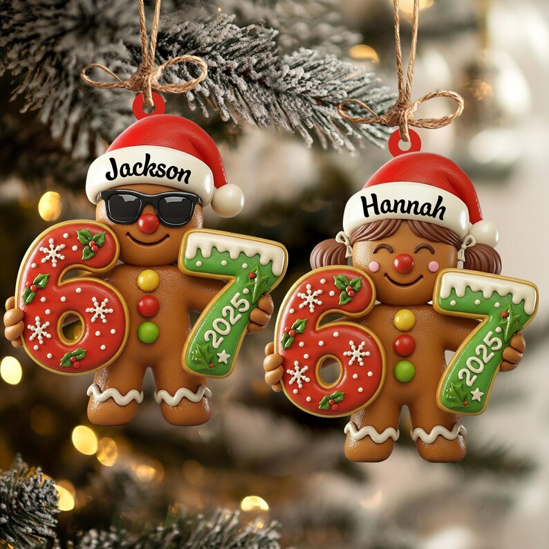 May include: Two gingerbread man Christmas ornaments. One wears sunglasses and a Santa hat with the name "Jackson". The other has pigtails and a Santa hat with the name "Hannah". Each holds a "67" and "2025" ornament.
