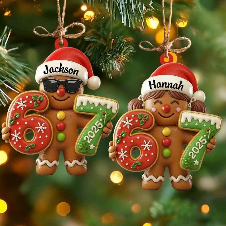 May include: Two gingerbread man Christmas ornaments. One wears sunglasses and a Santa hat with the name "Jackson". The other has pigtails and a Santa hat with the name "Hannah". Each holds a "67" and "2025" ornament.