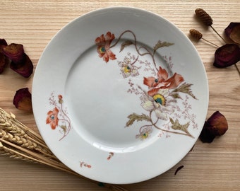 Assiette sur pied en porcelaine de Limoges