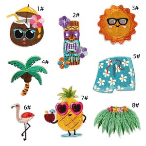May include: A selection of embroidered patches with tropical designs. The patches depict a coconut with sunglasses, a tiki statue, a smiling sun wearing glasses, a palm tree, blue shorts with white flowers, a flamingo, a pineapple with heart-shaped sunglasses, and a grass skirt.