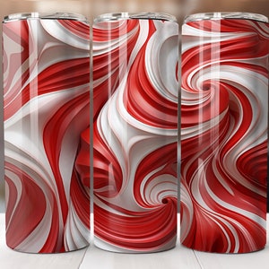 May include: Three stainless steel tumblers with a red and white swirling pattern. The pattern resembles candy canes.