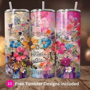 May include: Three stainless steel tumblers with colorful floral and music note designs. The tumblers are on a wooden surface.