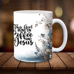 May include: White ceramic mug with a black and white design that says "This Girl Runs On Coffee And Jesus". The mug has a blue and white floral design on the right side.