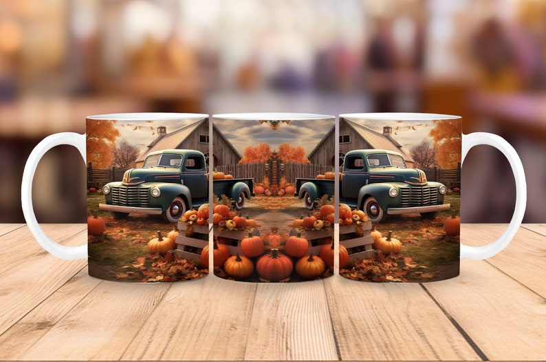 May include: White ceramic mug featuring a fall scene with a vintage green pickup truck, pumpkins, and a barn. The design includes orange and brown autumn leaves, creating a seasonal theme. The mug has a white handle.