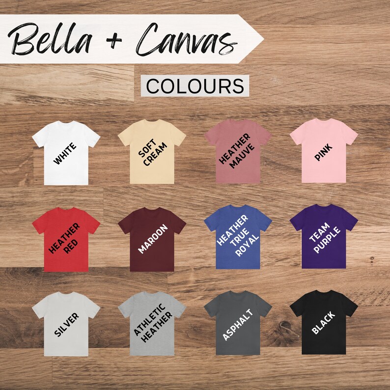 May include: A Bella + Canvas colour chart showing 12 different t-shirt colours. The colours are: White, Soft Cream, Heather Mauve, Pink, Heather Red, Maroon, Heather True Royal, Team Purple, Silver, Athletic Heather, Asphalt, and Black.