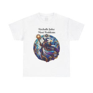 May include: White t-shirt with a stained glass style illustration of a wizard holding a staff with a fireball at the end. The text "Fireballs Solve Most Problems" is above the illustration.