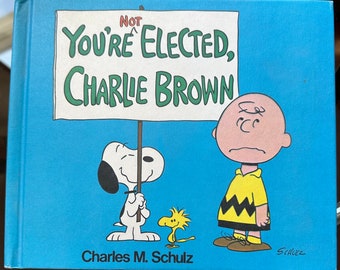 You're Not Elected, Charlie Brown de Charles M. Schulz (1973), couverture rigide, première édition