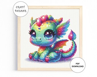 May include: A colorful cross stitch pattern featuring a cute, cartoon dragon with large eyes and a rainbow-colored body. The dragon is sitting on a white background.