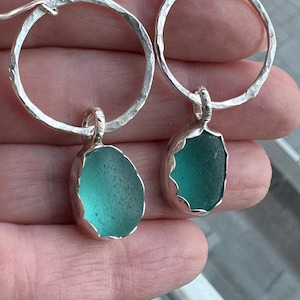 Hand made genuine sea glass dangle earrings.  Sterling silver, sea glass earrings/handmade earrings. Turquoise sea glass earrings