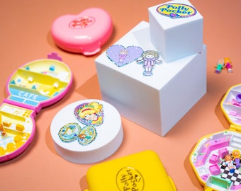 Confezione da 5 adesivi olografici glitterati Polly Pocket da 5 cm (PPLMSTK01)