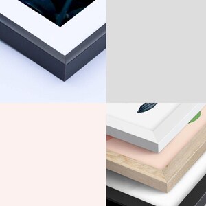 May include: Close-up of a black metal frame with a white mat and a picture of green leaves. The text "METAL FRAME" is visible in the image.  The image also shows a stack of wooden frames in different colors and sizes. The text "WOODEN FRAMES" is visible in the image.