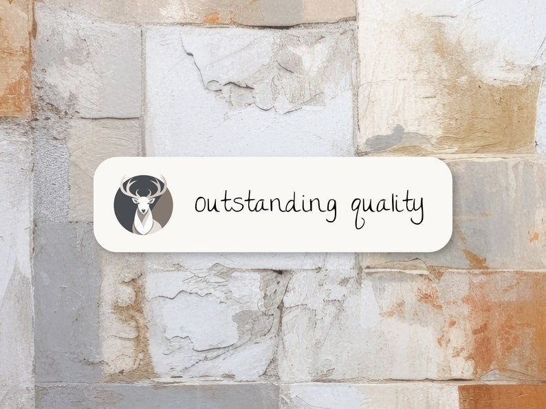 May include: A white rectangular sign with rounded corners features a stylized deer head illustration in a circle on the left side and the text "outstanding quality" in black handwritten font on the right side.