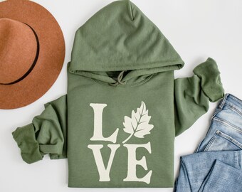 Sudadera con capucha de hojas de otoño: Sudadera acogedora para la temporada de otoño.