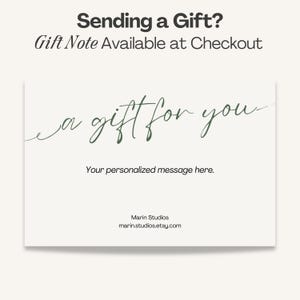 May include: A rectangular gift note card with a cream background. The text reads: Sending a Gift? Gift Note Available at Checkout. The centre features the dark green cursive script: a gift for you. Below is: Your personalised message here. Marin Studios marin.studios.etsy.com.