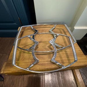 May include: A white ceramic mug with a black handle and the text "But First, Coffee" in a bold, black font. The mug is likely 11-15 ounces in size, perfect for a morning beverage.