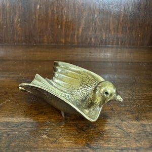 Brass peace dove made in Israel vintage pipe holder trinket dish