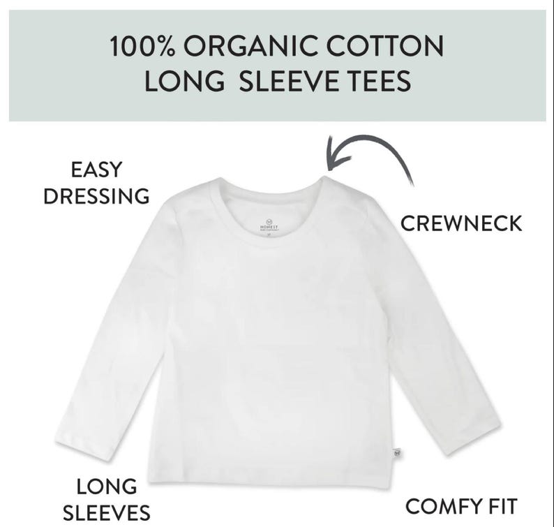Op de afbeelding: Een wit shirt met lange mouwen en een ronde hals, gemaakt van 100% biologisch katoen. De afbeelding bevat de teksten: 100% ORGANIC COTTON LONG SLEEVE TEES, EASY DRESSING, CREWNECK, LONG SLEEVES en COMFY FIT, met een pijl naar de halslijn.