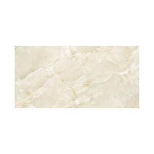 May include: A rectangular tile featuring a polished surface with a cream and off-white marble pattern. The design displays soft, flowing veins in shades of light beige and translucent white, creating a smooth, continuous stone-like appearance.