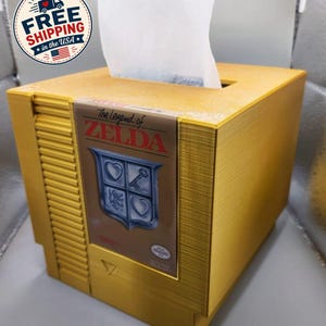 Nintendo NES Legend of Zelda guldfärgat näsduksaskfodral till kassett.