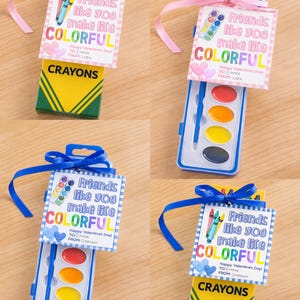 May include: Valentine's Day gifts featuring crayons and watercolor sets. Each gift is adorned with a tag that reads "Friends like you make life COLORFUL." The crayon box is green and yellow. The watercolor sets are blue and white. Each gift is tied with a ribbon.