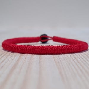 Bracciale tibetano per la protezione, braccialetto di corda rossa, braccialetto di perle di lava per la buona fortuna, regalo significativo per lui