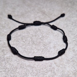 Zwarte 7-knopen armband, touwarmband, beschermingsarmband voor heren en dames