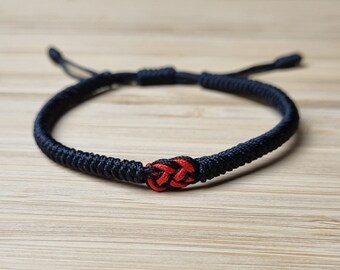 Bracelet infini noué, bracelet tibétain noir et rouge, bracelet avec breloques pour couple