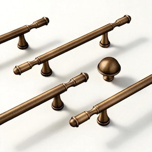 May include: Bronze-toned cabinet hardware set, including several bar pulls and a round knob. The pulls have a textured, ridged design and are mounted on decorative bases. The hardware is arranged on a white background, showcasing the details of the cabinet pulls.