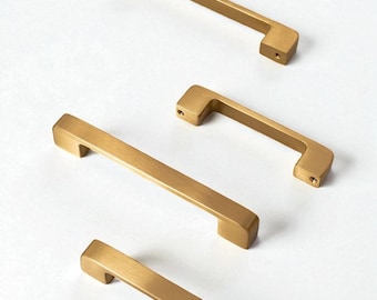 Manijas y pomos de latón dorado para gabinetes: herrajes modernos minimalistas