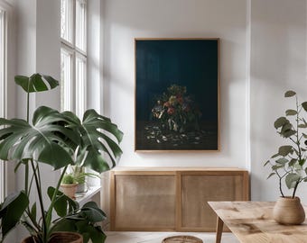 May include: A framed print of a still life featuring a bouquet of flowers in a vase on a dark blue background. The print is hanging on a white wall in a modern living room with a wooden cabinet and a wooden table.