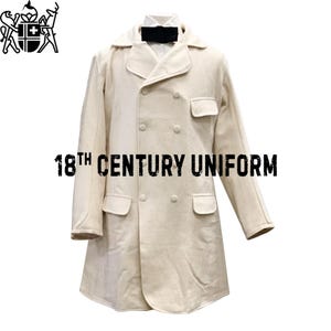 May include: A white double-breasted coat with a black bow tie. The coat has two pockets and is labeled "18th CENTURY UNIFORM".
