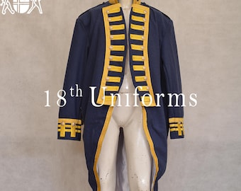 May include: A navy blue military jacket with gold trim and buttons. The jacket has a long tail and is worn on a mannequin.