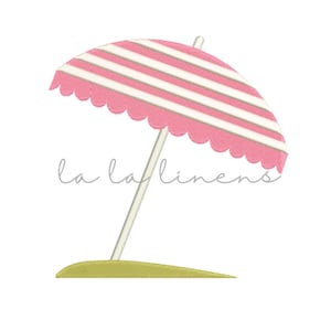 May include: Pink and white striped beach umbrella with a scalloped edge, standing on a green patch of grass.  The text "la la linens" is written in gray below the umbrella.