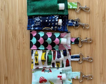 Chap stick holders , with claw clip , and one free chapstick