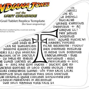 May include: A black and white replica of the Holy Grail Tablet from the Indiana Jones and the Last Crusade movie. The tablet features a cross and text in Latin, including the phrase "Ubi gradalis quae continet sanguinem Jesu Christi nostri permanet in aeternum".