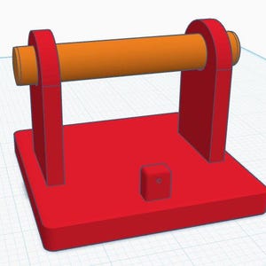 May include: A 3D-rendered red and orange object. The base is a solid red rectangle with a small red cube attached. Two red upright supports hold an orange cylinder. The cylinder is horizontal and appears to be a handle.