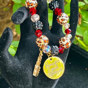 Handmade Leopard Print Beaded Bracelet With Red (Royalty) Gemstones with Charms
