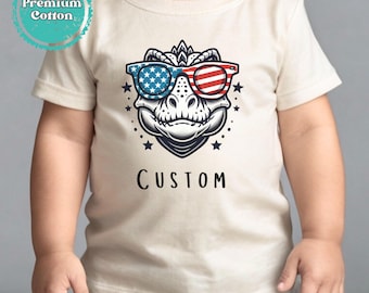 Custom Name 4th of July Toddler Shirt  Dinosaur Toddler TShirt, Personalized Dinosaur 4th of July Tee, Patriotic Dinosaur Shirt For Kids