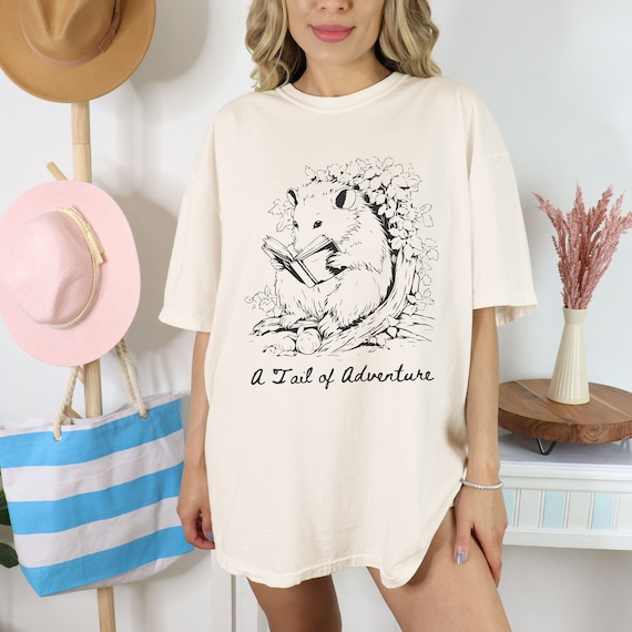 Opossum Reading Shirt, Comfort Colors Possum Shirt, A Tail Of Adventure Opossum T-Shirt