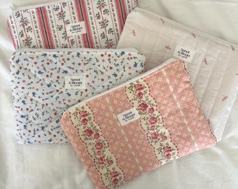 Bolsa acolchada con cremallera
