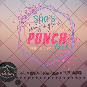 May include: A pink and blue graphic design with a geometric frame and colorful paint splatters. The text reads "She's beauty & grace with a punch you in the face."