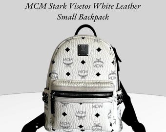 MCM ホワイトバックパック スタッズ付き　袋付き Mini Stark サイドスタッズ バックパック - ヴィセトス