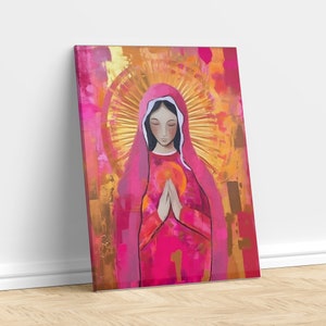 May include: A painting of a woman in a pink robe with a halo of light behind her. She is holding her hands together in prayer. The background is a mix of gold and pink.