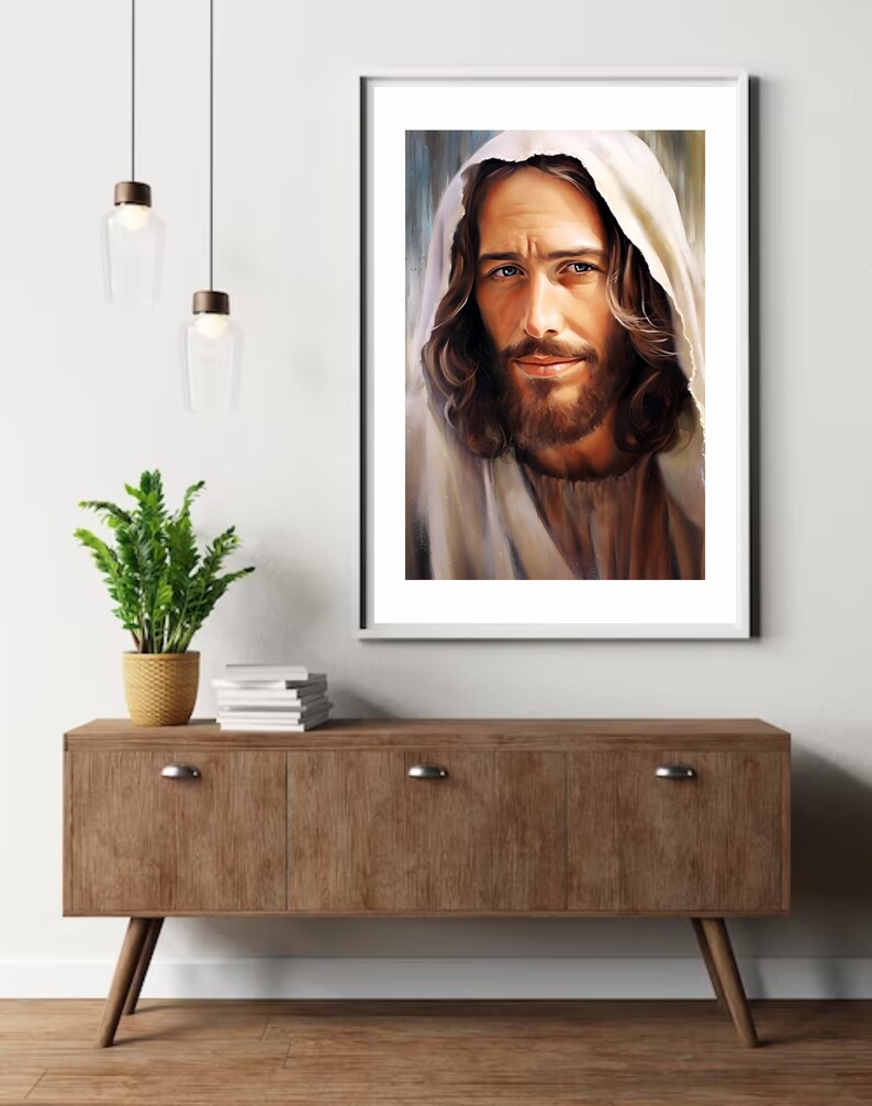 May include: A painting of a man with long brown hair and a beard, wearing a white robe. He is looking directly at the viewer with a gentle expression.