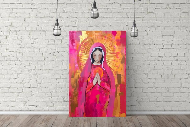 May include: A painting of a woman in a pink robe with a golden halo. She is praying with her hands clasped together. The background is a mix of pink, gold, and white.