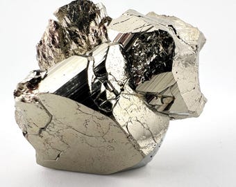 Clúster de pirita dodecaédrica (Huanzala, Perú) - 37g