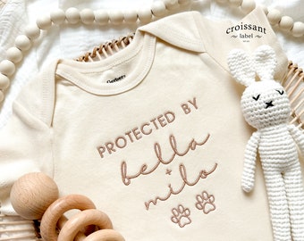 Protected By Dog Name EMBROIDERED Personalized Announcement Baby Onesies®, Custom baby shower gift, custom pet name Custom Dog Onesies®
