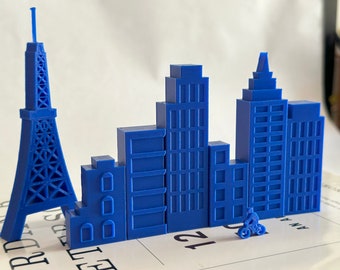 Paysage urbain : impression 3D - 7 bâtiments miniatures dans différents styles architecturaux - en bleu et blanc